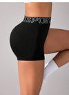 Shorts sportivi elastici con cintura